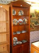 A mahogany bookcase with two door base. COLLECT ONLY.