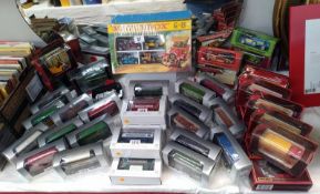 A good selection of EFE diecast buses, Yesteryear vans and Matchbox G-5 gift set