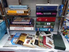 A good collection of antique reference books including medals & Rolex Oyster catalogues