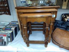 A medium oak nest of tables, COLLECT ONLY.