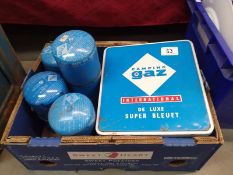 A camping gaz stove & quantity of gas cannisters