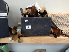 A box of shoe cleaning brushes