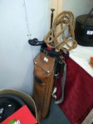 A golf bag containing umbrellas COLLECT ONLY