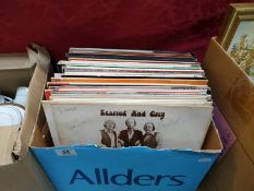 A quantity of LP records including signed copy of 'Scarred & Grey' by Wells Fargo