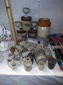 A quantity of stoneware bottles and jars