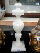 A heavy tall alabaster table lamp