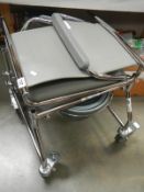 A new disabled push along chair/commode