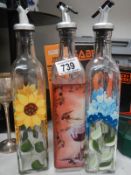 3 hand painted vinegar bottles