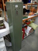 A double lock gun cabinet