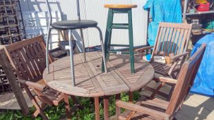 A wooden table & chairs with stools. Collect Only.