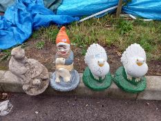 A quantity of concrete garden ornaments being tortoise, cat, painted gnome & 2 painted doves etc.