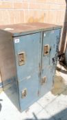 A 4 compartment metal cabinet. Collect Only.