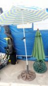 2 parasols & 2 cast iron bases. Collect Only.