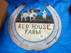 A Red House Farm sign