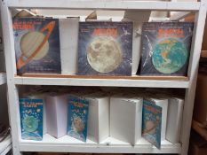 5 large boxes and 14 small boxes of glow in the dark, moon, earth and Saturn.