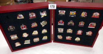 A cased set of Arsenal victory pins with certificates. 30 in total