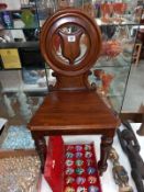 A Victorian mahogany hall chair A/F
