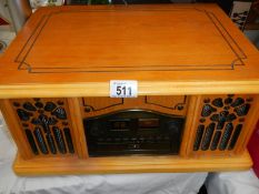 A wood case record player. COLLECT ONLY.