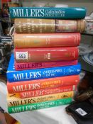 A quantity of antique reference books.
