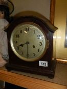 A circa 1930's mahogany mantel clock in working order.