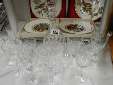 A cut glass decanter and a quantity of glasses. Collect Only.