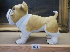 A bulldog figure.