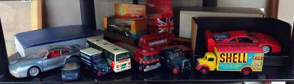 A quantity of Die cast cars etc.