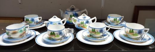 A Japanese egg shell china tea set, Geisha girl in cups (chip in one saucer).
