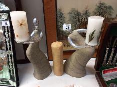 2 mixed media figural candle holders & a bees wax candle