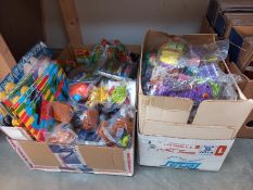 A large lot of McDonalds toys still in bags, from the 90's and 2000's, may have some complete lots