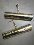 Two brass picture lights.