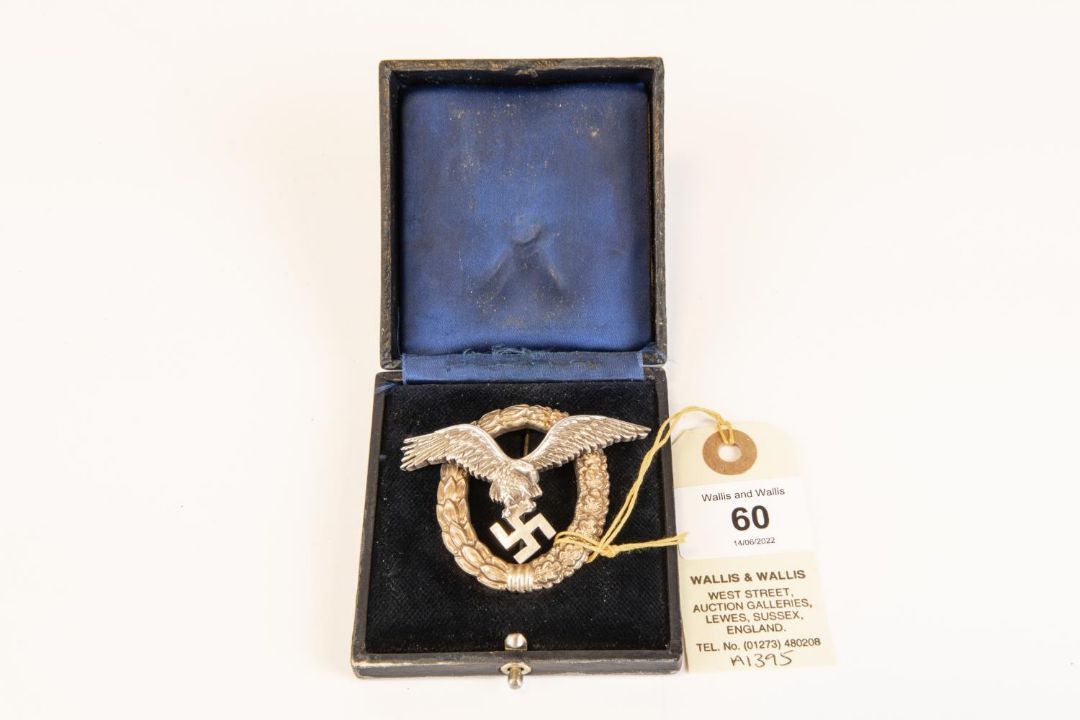 †A Third Reich Pilot Observer's badge, of heavy nickel silver construction, the back stamped "C.E. - Image 1 of 4