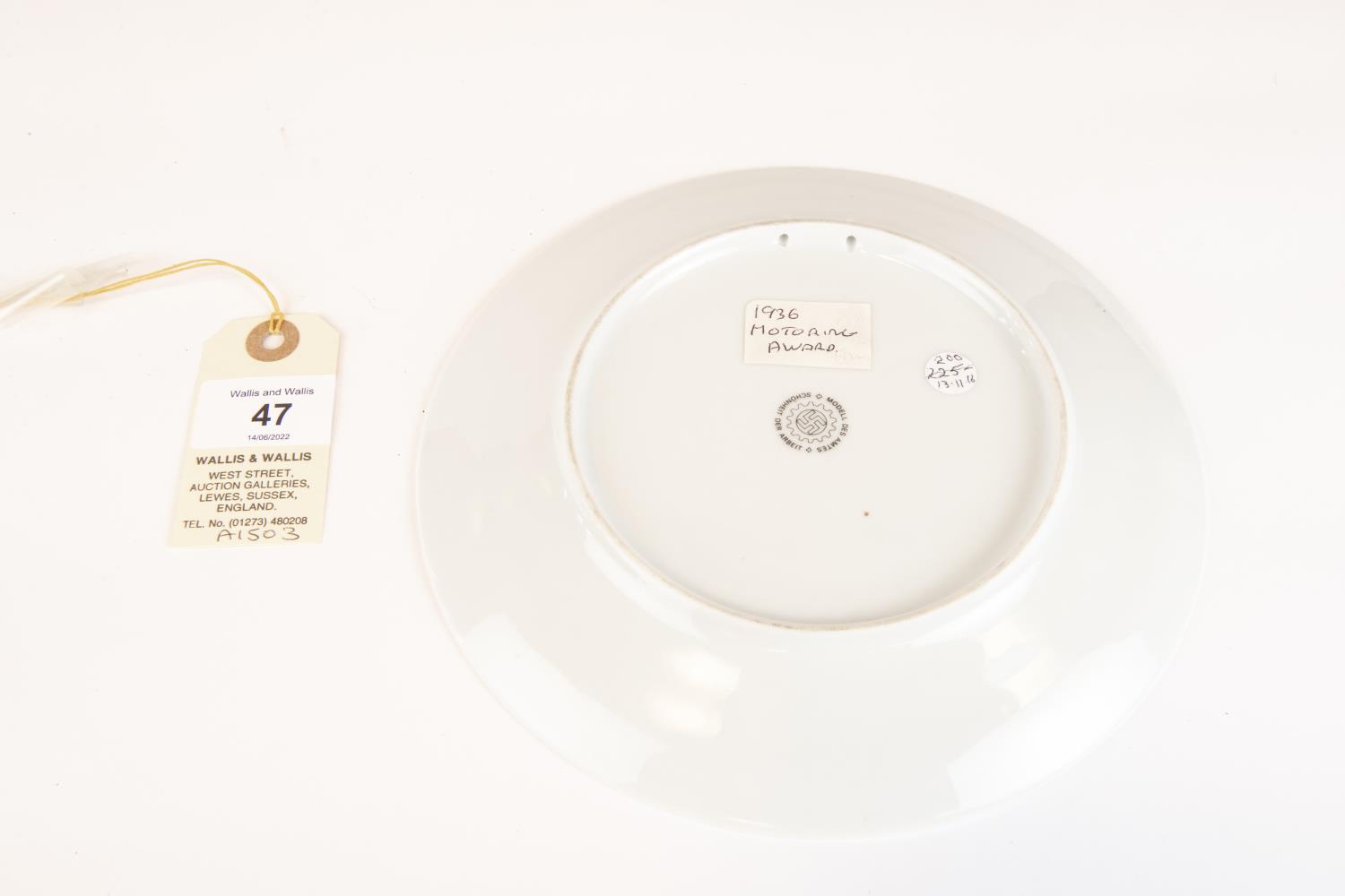 A Third Reich china plate motoring award, 125mm diameter, eagle and swastika motif surrounded by " - Image 2 of 2