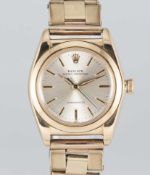 A GENTLEMAN'S 14K SOLID GOLD ROLEX OYSTER PERPETUAL CHRONOMETER 