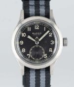 A GENTLEMAN'S BRITISH MILITARY BUREN GRAND PRIX W.W.W. WRIST WATCH CIRCA 1945, PART OF THE 