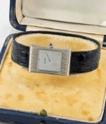A RARE GENTLEMAN'S 18K SOLID WHITE GOLD BOUCHERON REFLET WRIST WATCH DATED 1966, WITH LONDON
