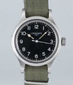A GENTLEMAN'S STAINLESS STEEL BRITISH MILITARY LONGINES RAF PILOTS WRIST WATCH DATED 1956, WITH