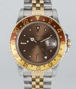 A GENTLEMAN'S STEEL & GOLD ROLEX OYSTER PERPETUAL GMT MASTER 