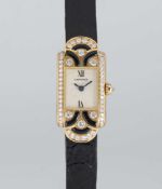 A LADIES 18K SOLID GOLD, DIAMOND & ONYX CARTIER TANK 