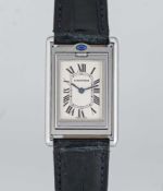 A GENTLEMAN'S SIZE STAINLESS STEEL CARTIER TANK BASCULANTE WRIST WATCH CIRCA 2000s, REF. 2405