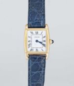 A RARE LADIES 18K SOLID GOLD CARTIER PARIS REVERSO WRIST WATCH CIRCA 1970s Movement: Manual wind,