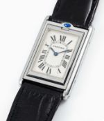 A GENTLEMAN'S STAINLESS STEEL CARTIER TANK BASCULANTE 