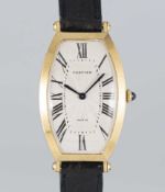 A GENTLEMAN'S 18K SOLID GOLD CARTIER PARIS CINTREE TONNEAU WRIST WATCH CIRCA 1990s Movement: