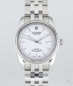 A LADIES MID-SIZE STAINLESS STEEL TUDOR GENEVE GLAMOUR DATE BRACELET WATCH CIRCA 2010, REF. 53000