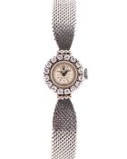 A FINE LADIES 18K SOLID WHITE GOLD & DIAMOND ROLEX PRECISION BRACELET WATCH CIRCA 1960s, WITH