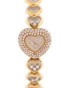 A FINE LADIES 18K SOLID YELLOW GOLD & DIAMOND CHOPARD HAPPY DIAMONDS BRACELET WATCH CIRCA 1990s,