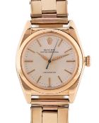A GENTLEMAN'S 14K SOLID GOLD ROLEX OYSTER PERPETUAL CHRONOMETER 