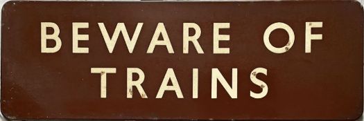 British Railways (Western Region) ENAMEL SIGN 'Beware of Trains'. A flanged sign measuring 36