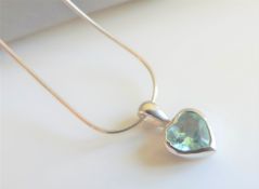 Sterling Silver Blue Topaz Heart Pendant Necklace