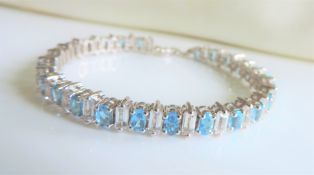 Sterling Silver 16ct Blue and White Topaz Line Bracelet New with Gift Box